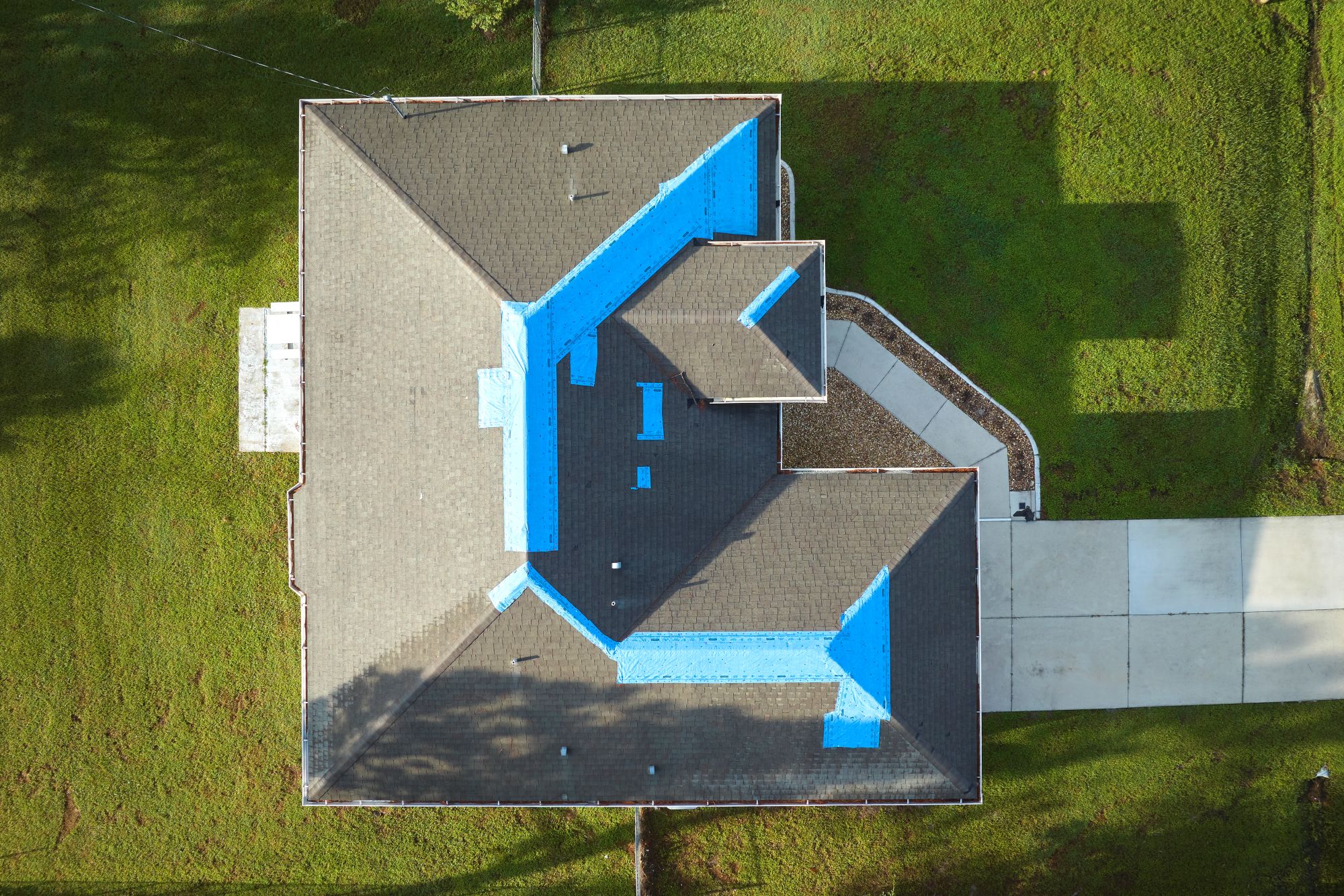 Homeowner discussing roofing estimate