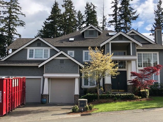 Roof moss treatment Redmond Washington